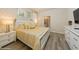 Large main bedroom with king-size bed and en-suite bathroom at 5452 Misty Oak Cir, Davenport, FL 33837