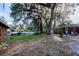 Large backyard with patio and trees at 646 Palm Dr, Oviedo, FL 32765