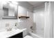 Clean bathroom with tub, shower, and updated vanity at 646 Palm Dr, Oviedo, FL 32765