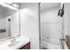 Clean bathroom with single vanity, shower/tub combo and a modern design at 646 Palm Dr, Oviedo, FL 32765