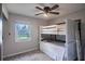 Bedroom with bunk beds, ceiling fan, and plenty of natural light at 646 Palm Dr, Oviedo, FL 32765