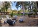 Charming backyard fire pit with surrounding seating at 646 Palm Dr, Oviedo, FL 32765