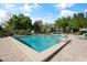 Inviting community pool with ample deck space for lounging at 700 Melrose Ave # A 22, Winter Park, FL 32789