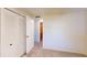 Spacious bedroom with double door closet and carpet at 711 Dolphin Dr, Tavares, FL 32778