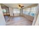 Bright dining area with wood-look floors at 711 Dolphin Dr, Tavares, FL 32778