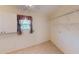 Laundry room with shelving and window for natural light at 711 Dolphin Dr, Tavares, FL 32778