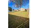 Grass backyard with a view of the house at 7132 Holly Creek Rd, Mount Dora, FL 32757