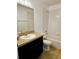 Bathroom with tub, shower, and dark vanity at 7132 Holly Creek Rd, Mount Dora, FL 32757