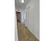 Bright hallway with tile floors and neutral walls at 7132 Holly Creek Rd, Mount Dora, FL 32757