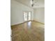 Living room with tile floors and sliding glass doors at 7132 Holly Creek Rd, Mount Dora, FL 32757