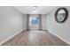 Bright bedroom with wood-look floors and ceiling fan at 802 Rugby St # 802, Orlando, FL 32804