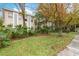 Building exterior showcasing landscaping and parking at 802 Rugby St # 802, Orlando, FL 32804