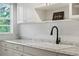 Modern kitchen sink with a sleek black faucet at 802 Rugby St # 802, Orlando, FL 32804