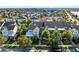 Aerial view of houses and palm trees at 8136 Tavistock Lakes Blvd, Orlando, FL 32827