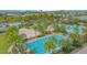 Resort-style pool with multiple pools and a volleyball court at 8136 Tavistock Lakes Blvd, Orlando, FL 32827