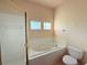 Bathroom with oval tub and walk-in shower at 910 Gran Bahama Blvd # 910, Davenport, FL 33897