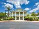 Two-story building with columns and landscaping at 910 Gran Bahama Blvd # 910, Davenport, FL 33897