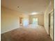 Bright living room with access to balcony at 910 Gran Bahama Blvd # 910, Davenport, FL 33897