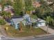 Aerial view of a single-Gathering home with a pool and lush landscaping at 922 Fort Smith Blvd, Deltona, FL 32738