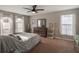 Cozy bedroom with ample natural light and a ceiling fan at 922 Fort Smith Blvd, Deltona, FL 32738