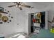 Bedroom with large closet, dresser and ceiling fan at 1004 Hornbeam St, Oviedo, FL 32765