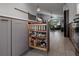 Well-organized kitchen with a pull-out spice rack and ample storage at 1004 Hornbeam St, Oviedo, FL 32765