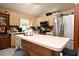 Modern kitchen with an island and stainless steel appliances at 1076 Country Cove Ct, Oviedo, FL 32766