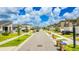 Street view of houses in a residential neighborhood at 1146 Boardwalk Pl, Kissimmee, FL 34747