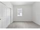 Simple bedroom with neutral walls and carpet at 1146 Boardwalk Pl, Kissimmee, FL 34747