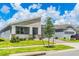 Modern one-story home with gray exterior at 1146 Boardwalk Pl, Kissimmee, FL 34747