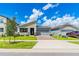 Modern one-story home with gray exterior at 1146 Boardwalk Pl, Kissimmee, FL 34747