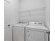 Convenient laundry room with Whirlpool washer and dryer at 1146 Boardwalk Pl, Kissimmee, FL 34747