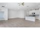 Spacious living room with tile flooring and kitchen views at 1146 Boardwalk Pl, Kissimmee, FL 34747