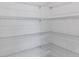 Walk-in pantry with wire shelving providing ample storage space at 1146 Boardwalk Pl, Kissimmee, FL 34747