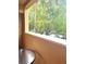 Private balcony overlooking lush green trees at 12539 Floridays Resort Dr # 210D, Orlando, FL 32821