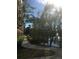 Curving walkway alongside a lake, offering a tranquil path at 12539 Floridays Resort Dr # 210D, Orlando, FL 32821