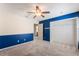 Bedroom with blue and white walls and ceiling fan at 131 Bristol Forest Trl, Sanford, FL 32771