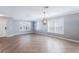 Dining room with tile floor, chandelier, and shelving at 131 Bristol Forest Trl, Sanford, FL 32771