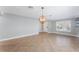 Light dining room with tile floors and chandelier at 131 Bristol Forest Trl, Sanford, FL 32771