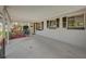 Spacious covered porch with concrete flooring at 145 Verbena Dr, Orlando, FL 32807