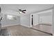 Living room featuring tile floors and a view into another room at 145 Verbena Dr, Orlando, FL 32807