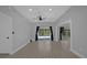 Living room with sliding glass doors leading to the pool at 145 Verbena Dr, Orlando, FL 32807