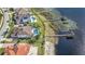 Lakefront property with private dock and beautiful landscaping at 15550 Avenue Of The Arbors, Winter Garden, FL 34787