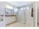 Bathroom with walk-in shower and modern vanity at 15550 Avenue Of The Arbors, Winter Garden, FL 34787