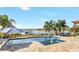 Resort-style pool with spa, lake view, and spacious patio at 15550 Avenue Of The Arbors, Winter Garden, FL 34787