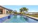 Luxury pool with a lake view and plenty of space at 15550 Avenue Of The Arbors, Winter Garden, FL 34787