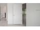 Clean hallway with doors to bedroom and bathroom at 16391 Sw 17Th Terrace Rd, Ocala, FL 34473