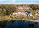 Aerial view of home with lakefront access at 1818 Foxboro Dr, Orlando, FL 32812