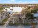 Aerial view of house and property near lake at 1818 Foxboro Dr, Orlando, FL 32812