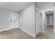 Entryway with wood-look floors and white door at 1818 Foxboro Dr, Orlando, FL 32812